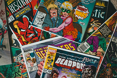 Cómics. Imagen de Erik Mclean cedida para uso gratuito en pexels. Cómics. Imagen de Erik Mclean cedida para uso gratuito en pexels.